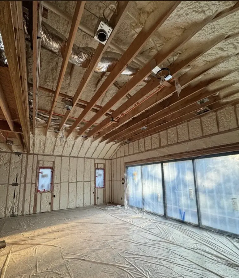 Interior walls and ceiling insulated with spray foam during new construction in Colonial Heights